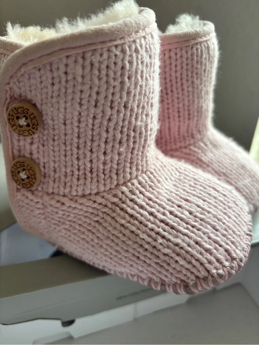 UGG Kids Light Pink Knit Bootie Slippers with Button Detail